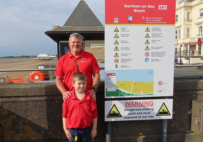 Dom Jefferies in Burnham-On-Sea with beach warden Gary Elliott