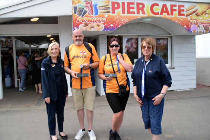 A father and daughter have raised £450 for the RNLI by walking from the pier at Weston-Super-mare to Burnham-On-Sea Pavilion.