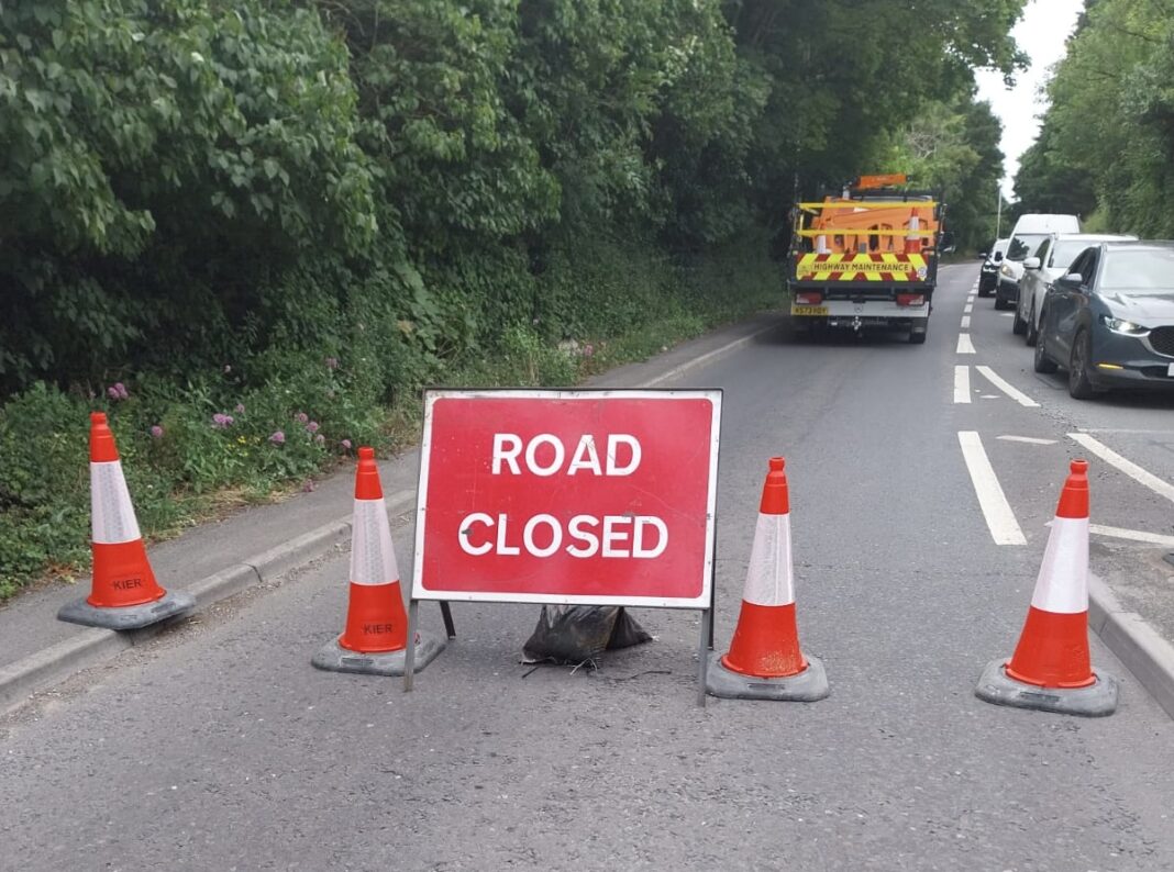 A38 re-opens after milk lorry overturns, spilling 1,800 litres of milk ...