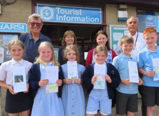 pupils with Brent Knoll Head Teacher Chris Burman, teacher Helen Bond, BIARS Chair Tom Ashton and former teacher and BIARS volunteer Alison Banham