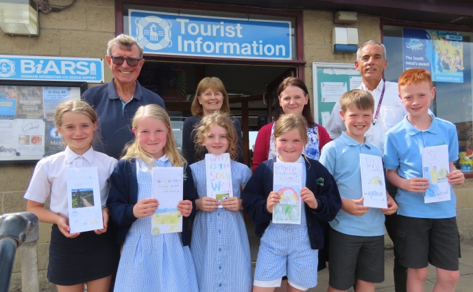 pupils with Brent Knoll Head Teacher Chris Burman, teacher Helen Bond, BIARS Chair Tom Ashton and former teacher and BIARS volunteer Alison Banham