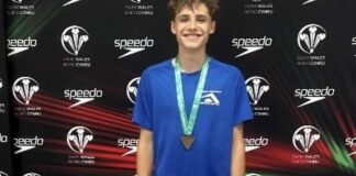 Leo Woodrow, swimmer from Burnham-On-Sea Academy Swim Team, celebrates success at Welsh Nationals