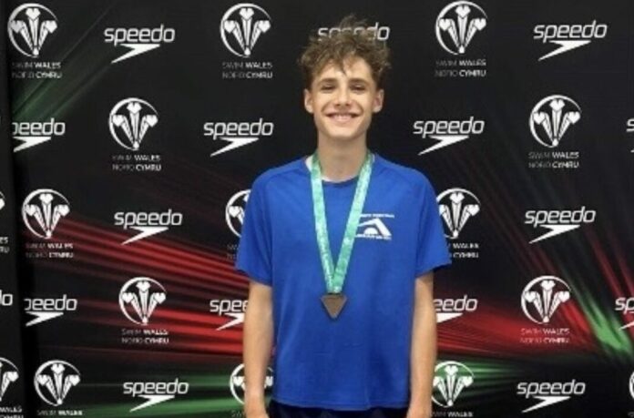 Leo Woodrow, swimmer from Burnham-On-Sea Academy Swim Team, celebrates success at Welsh Nationals