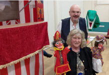 Burnham-On-Sea ‘Punch and Judy artist’ Professor Paul Wheeler with Moose President Rita Harris